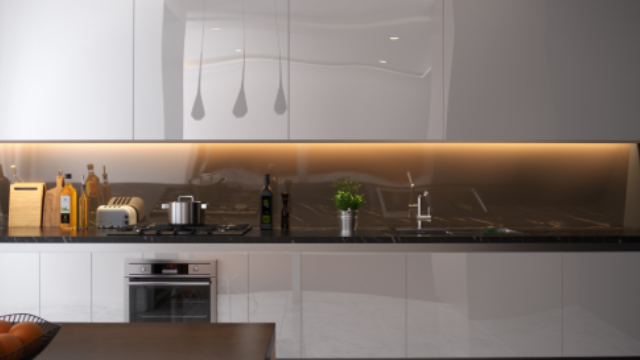 Modern open kitchen with stylish laminate finishes by Greenlam